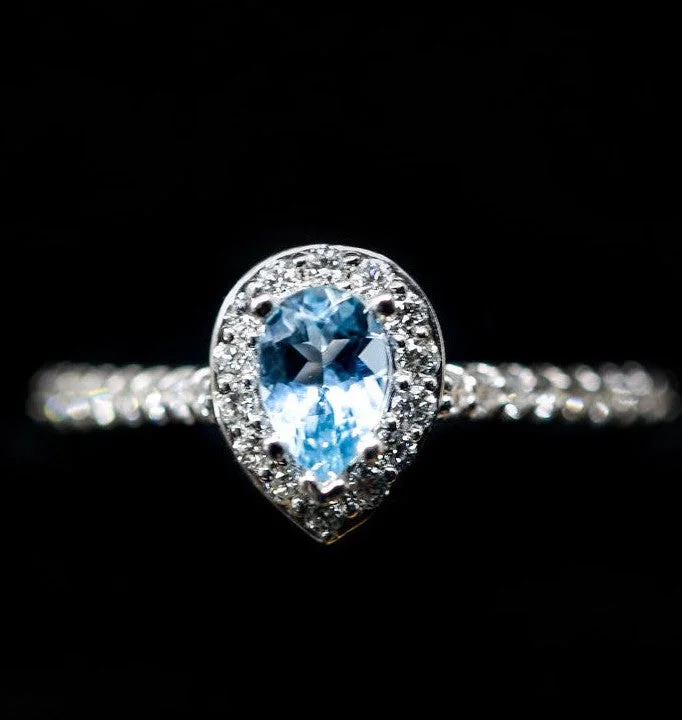 "AGNES" - PEAR CUT AQUAMARINE ENGAGEMENT RING WITH DIAMOND HALO & ACCENT BAND