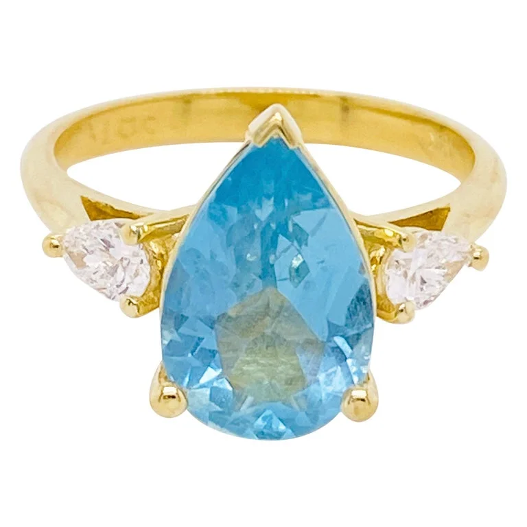 Pear Shaped Aquamarine and Diamond Three Stone Ring