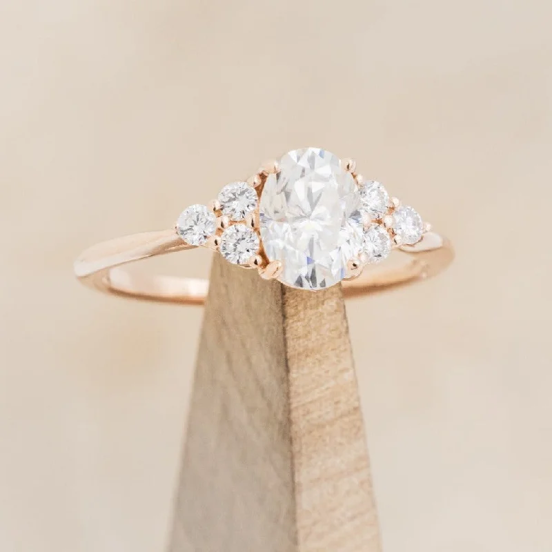 "RHEA" - OVAL CUT MOISSANITE ENGAGEMENT RING WITH DIAMOND ACCENTS