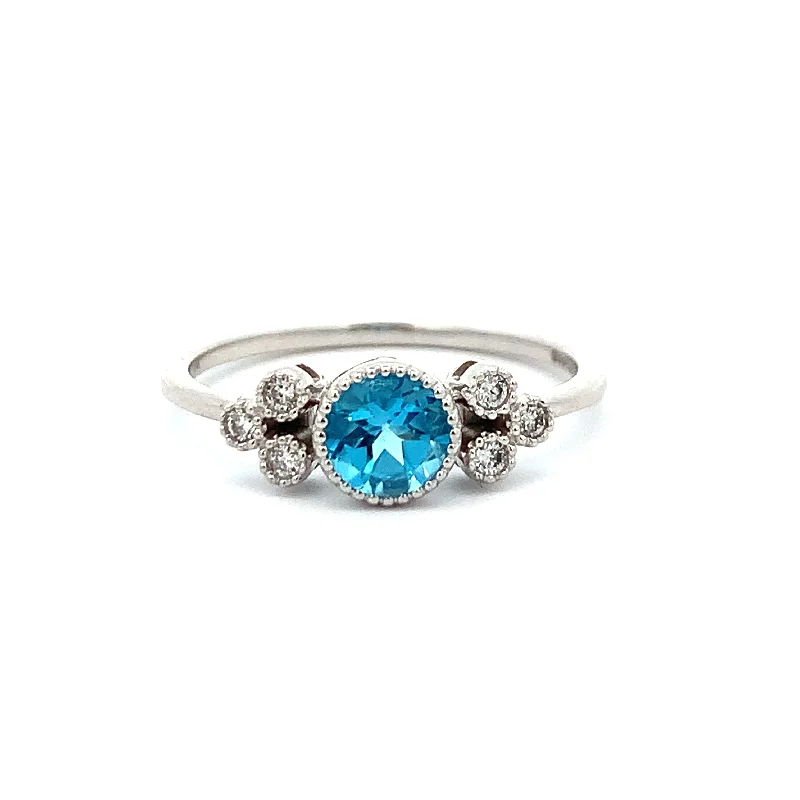 Blue Topaz and Diamond Ring in White Gold