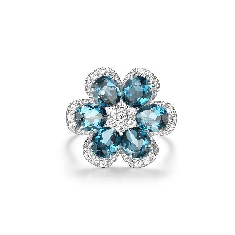 Sterling Silver Blue and White Topaz Flower Ring